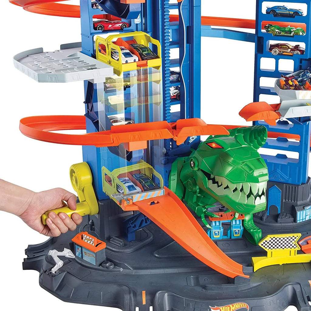 Hot Wheels City Ultimate Garage Track Set with 2 Toy Cars, Garage Playset Features Multi-Level Racetrack, Moving T-Rex Dino & Storage for 100+ 1:64 Scale Vehicles, Toy Gift for Kids 3 Years & Older