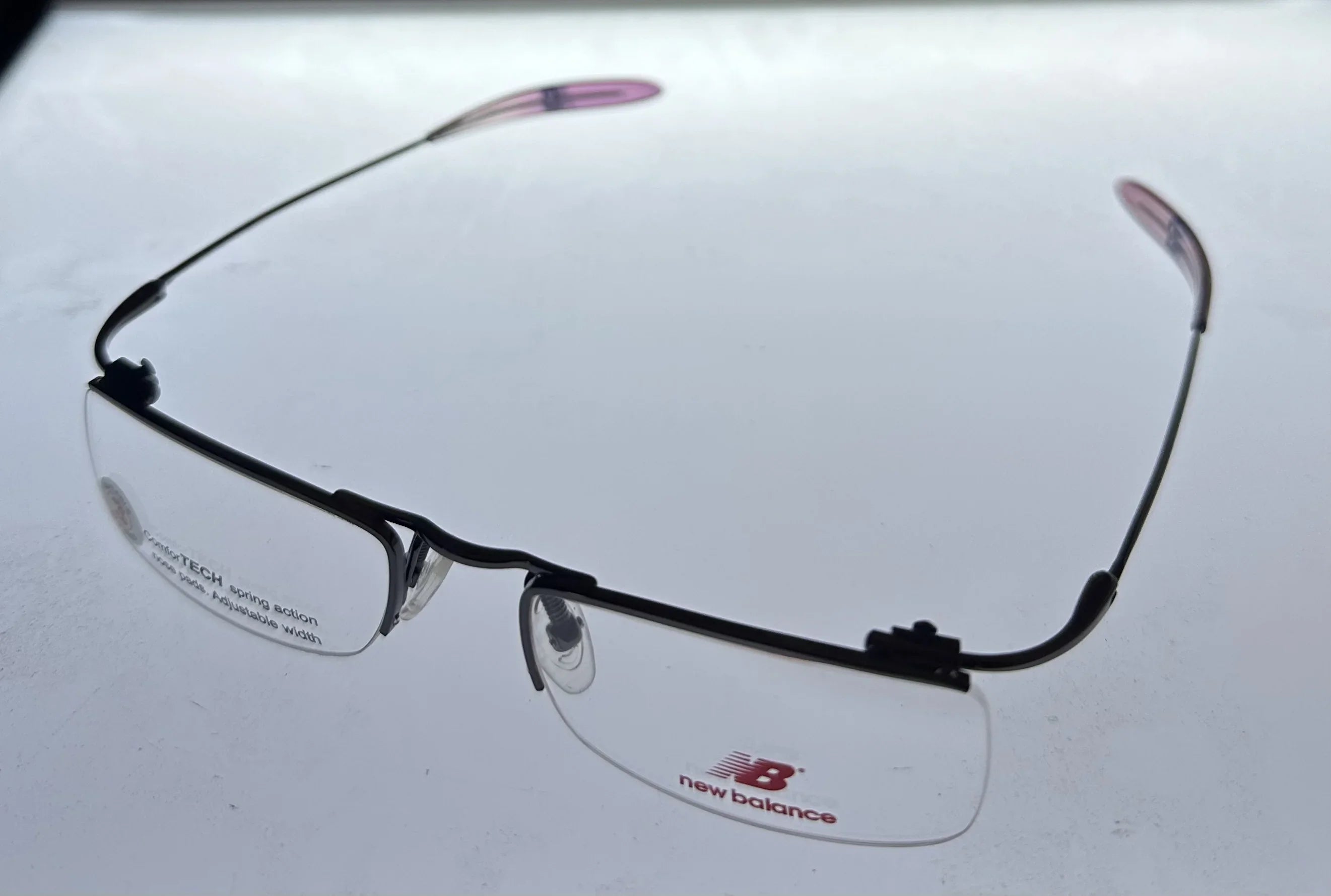 New Balance Mens Eyeglass Rectangle Rimless Metal NB 356 3 Gunmetal. 53mm